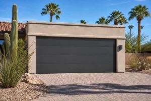 Steel garage door on a stucco Phoenix, Arizona home, one option in the steel vs aluminum garage door decision